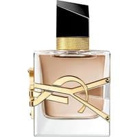 Clear glass bottle with gold YSL logo, black cap, and gold band, containing amber-colored YSL Libre Flowers & Flames Eau de Parfum.