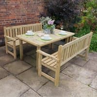 Wooden garden table with two matching benches, natural finish, slatted backs, set on a stone patio with tableware.