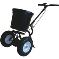 Black Handy THS50 push fertiliser spreader with large wheels, 23kg capacity hopper, and ergonomic handle.