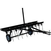 Black Handy THTD 40 towed de-thatcher with metal frame, dual wheels, and spring tines for lawn maintenance.