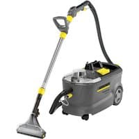 Gray Karcher Puzzi 10/1 cleaner with transparent water tank, long hose, and ergonomic handle.