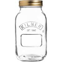 Clear Kilner glass preserve jar 1L with gold metal lid and embossed logo.