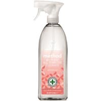 Clear Method anti-bacterial multi-surface cleaner with peach label, spray nozzle, and green cross logo.