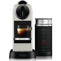 White Nespresso Citiz coffee machine with Aeroccino frother, black accents, and a cup of espresso.