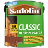 Green Sadolin Classic Wood Protection Woodstain can with brown lid, featuring "Deep Penetrating Protection" label.