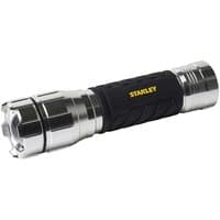 Stanley 1000 Lumens hand torch, silver with black grip, rugged design, and yellow logo on the handle.