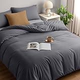Grey Utopia Bedding duvet cover set with soft microfibre polyester, includes matching pillowcases on a neatly made bed.