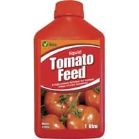 Red Vitax Liquid Tomato Feed bottle with green logo, white text, and tomato images, 1-litre size.