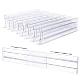 Clear plastic expandable drawer dividers, 8 pack, adjustable from 12.2 to 21.4 inches, for organizing various items.