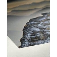 Hahnemühle Hemp White textured paper with visible fibers and a close-up of a printed rocky landscape.