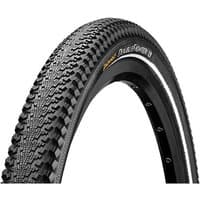 Black Continental Doublefighter III 26" tyre with knobby tread and reflective sidewall stripe.