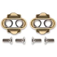 Crank Brothers Premium MTB Cleats, brass color, oval shape with two holes, includes four silver screws.