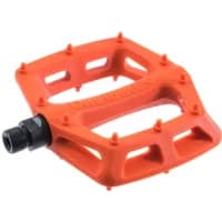 Orange DMR V6 plastic pedal with textured surface, nine grip pins, and black spindle.