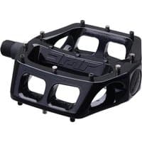Black DMR V8 Classic DU bike pedal with wide platform, nine pins per side, and embossed logo.