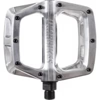 Silver DMR V8 flat MTB pedal with wide platform, nine black pins, and embossed logo.