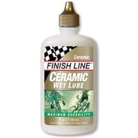 White Finish Line Ceramic Wet 120 ml lubricant bottle with black cap and cycling graphic on label.