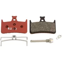 Red and black Hope Mono M4/E4 brake pads with metal spring clip and pin.