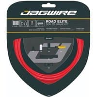 "Jagwire Road Elite Sealed Brake Kit with red cables, black housing, and connectors in a triangular black package"