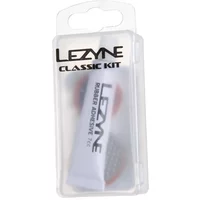 Clear plastic case with Lezyne Classic Repair Patch Kit, includes rubber adhesive tube and patches inside.