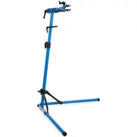 Blue Park Tool PCS10.3 repair stand with adjustable clamp, tripod base, and quick-release height adjustment.