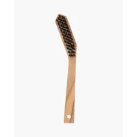 Wooden Peaty's drivetrain brush with angled handle and black bristles.