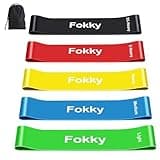 Set of five colorful Fokky resistance bands with varying thicknesses, labeled for resistance levels, includes black carry bag.