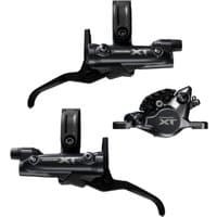 Black Shimano XT brake levers and calipers with silver accents and "XT" logo, featuring a sleek, compact design.