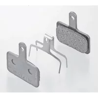 Shimano Deore M515 disc brake pads, metallic with mounting bracket, rectangular shape with tab for cable actuation.