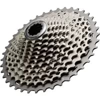 Silver Shimano Deore XT M8000 11-speed cassette with 11-42T gear range and intricate sprocket design.