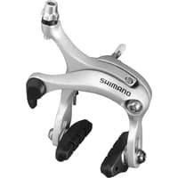 Silver Shimano R451 dual pivot brake caliper with black rubber pads and sleek aerodynamic design.