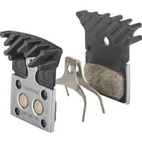 Shimano R805/R505 disc brake pads with metallic compound, black cooling fins, and silver backing plate.