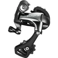 Black and silver Shimano RD-4700 Tiagra 10-speed rear derailleur with sleek curves and compact design.