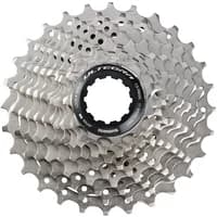 Shimano Ultegra R8000 11-speed cassette, silver steel sprockets with black central hub, compact and layered design.