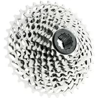 Silver SRAM PG1130 11-speed cassette with 11-36T range, featuring a stacked sprocket design and black central hub.