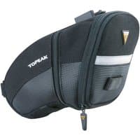 Black Topeak Aero Wedge Saddle Bag with QuickClick, featuring reflective strip and zippered compartments.