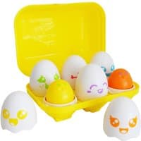 Yellow egg carton with six white plastic eggs, each with colorful facial expressions, one orange egg.