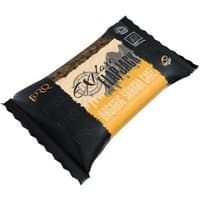 Torq Explore Flapjack, banana cake flavor, in black and yellow packaging, 65g bar with mountain graphic.