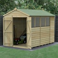 Wooden shed with green roof, double doors, shiplap panels, and windows; lawnmower visible inside.