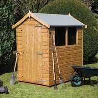 Wooden garden shed with shiplap cladding, apex roof, single door, and two windows, surrounded by garden tools.