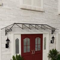 Black metal and clear polycarbonate door canopy with ornate brackets, mounted above a red double door on a brick wall.