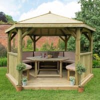 Luxury wooden garden gazebo with timber roof, hexagonal shape, furnished seating for 15, surrounded by greenery.