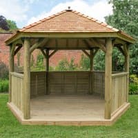 Luxury wooden garden gazebo with New England cedar roof, hexagonal shape, open sides, and seats up to 15 people.