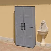 Gray Shire plastic garden storage cupboard with two doors, black handles, and shelves, standing on a patio.