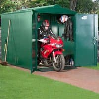Green metal motorbike garage with double doors, housing a red motorbike and helmet hooks inside.