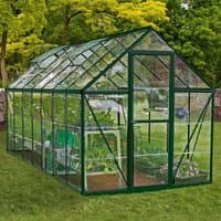 Green polycarbonate greenhouse with peaked roof, clear panels, and sturdy metal frame, measuring 6’ x 14’.