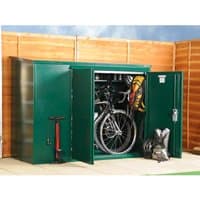 Green metal bike shed with double doors open, revealing stored bicycles and gear, compact 6' x 3' size.