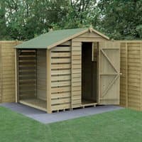 Wooden apex shed with logstore, overlap panels, green roof, open door, on concrete base, surrounded by fencing.