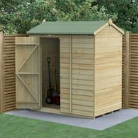 Wooden shiplap shed with green apex roof, windowless design, open door showing garden tools inside, set on patio.