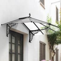 Black metal-framed door canopy with clear panels and decorative side brackets, mounted above a doorway.