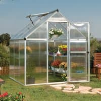 Silver polycarbonate greenhouse with twin-wall panels, peaked roof, and open door, showcasing plants inside.